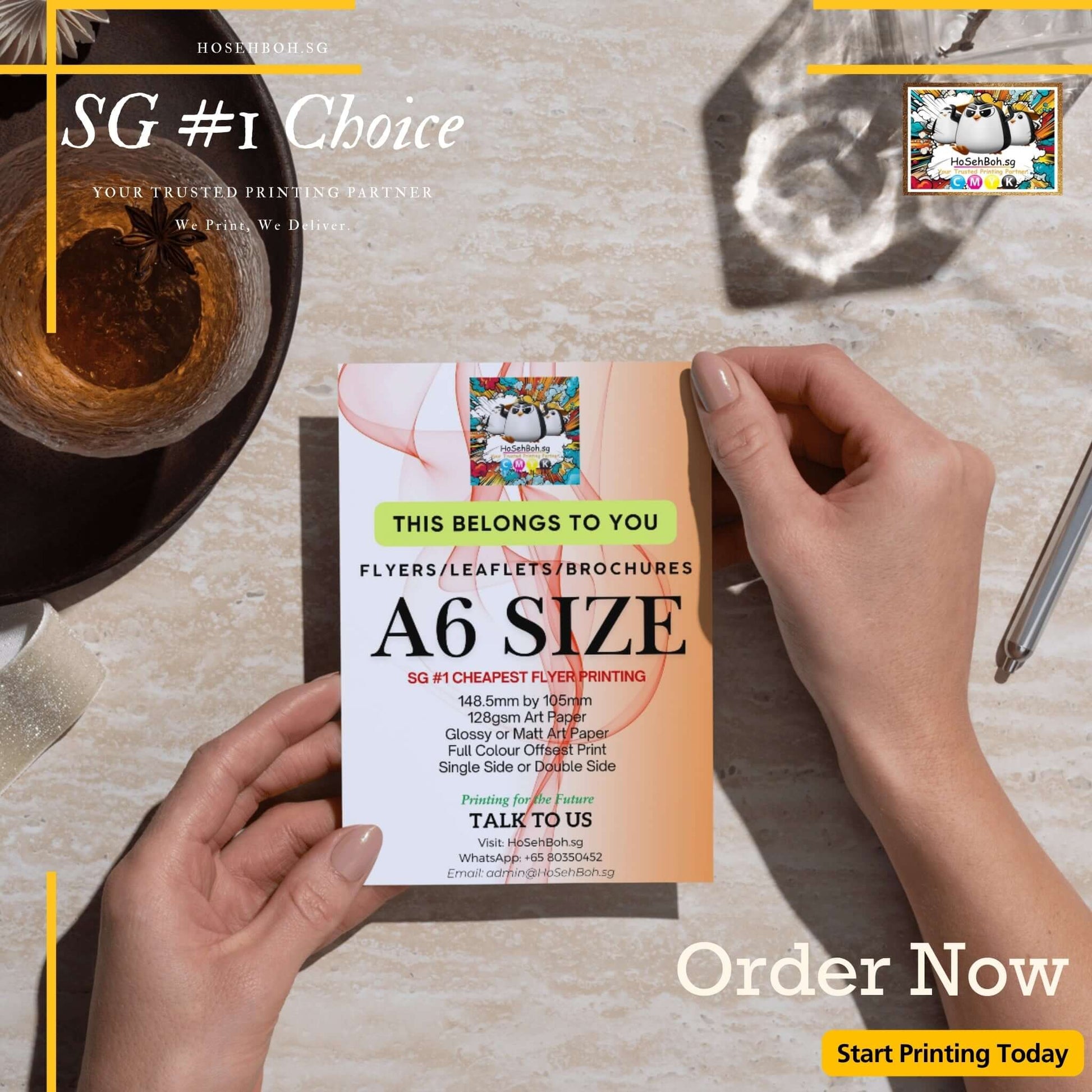 Hand holding A6 flyer showcasing cheapest flyer printing in Singapore, ideal for marketing promotions.