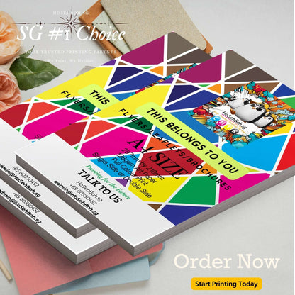 Vibrant A4 digital flyers printed, showcasing colorful design with 'Order Now' text for easy promotions.