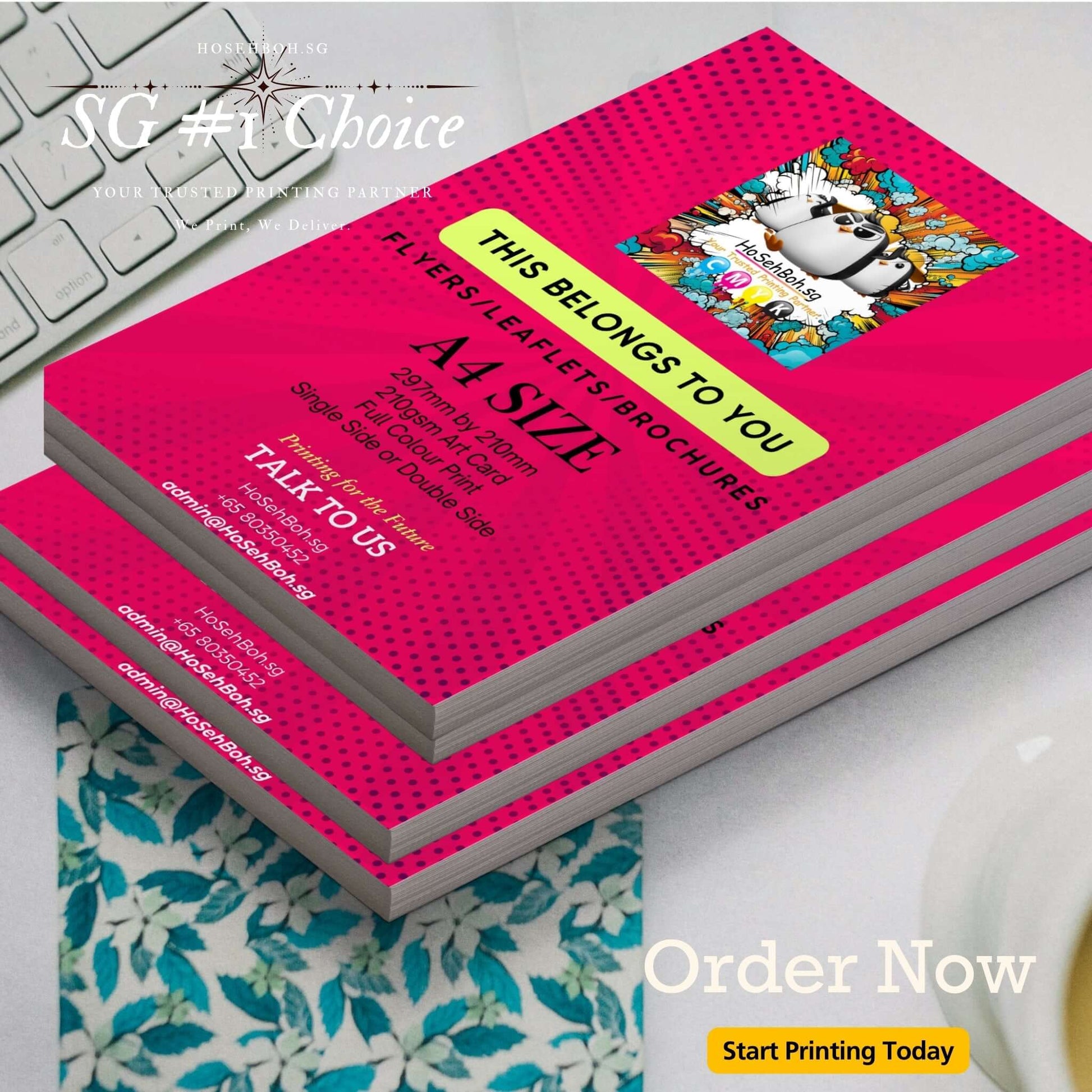 A4 flyers on a table promoting budget-friendly 210gsm printing service in Singapore, with colorful design elements.