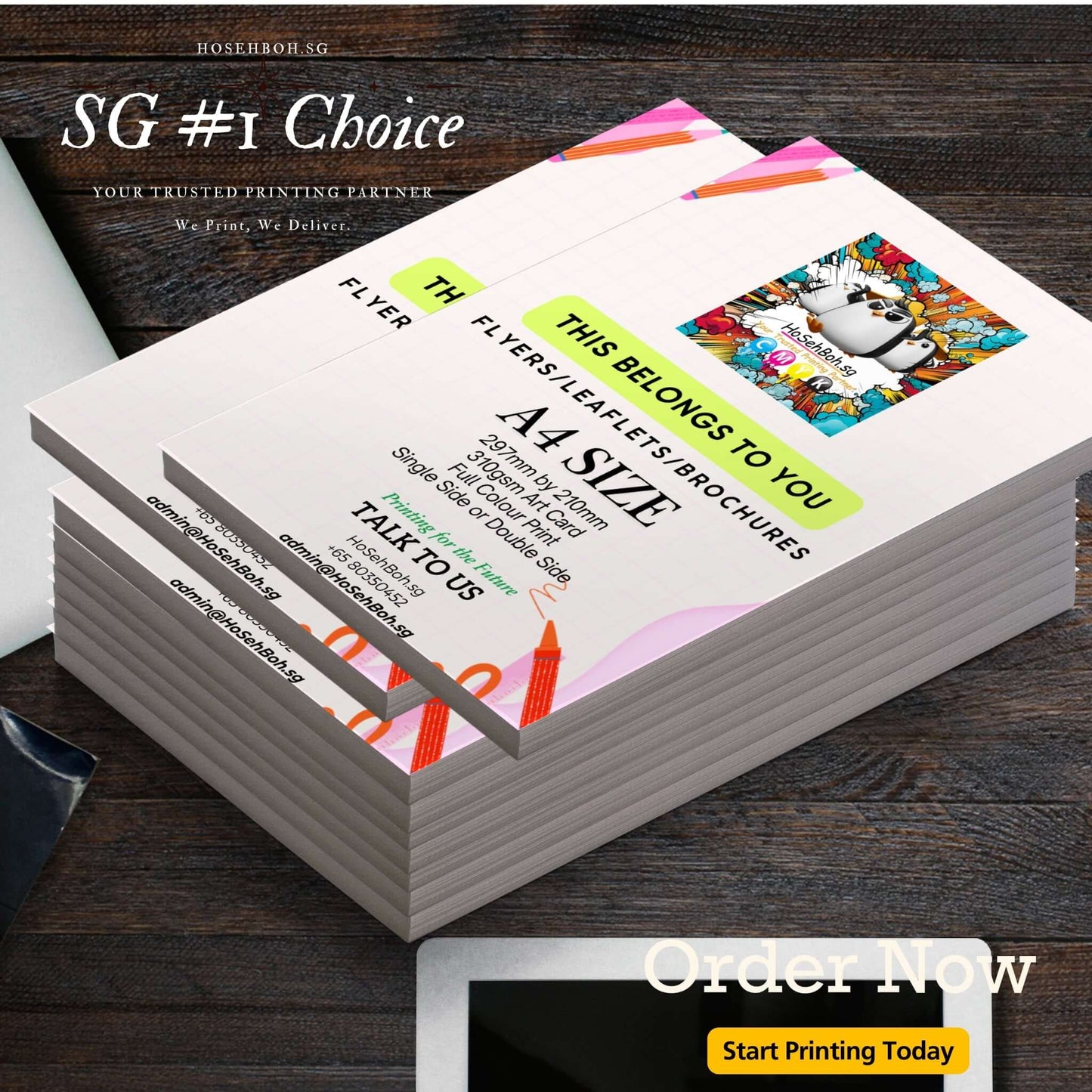 A4 card flyers stacked, showcasing vibrant colors and graphics, promoting printing services in Singapore.