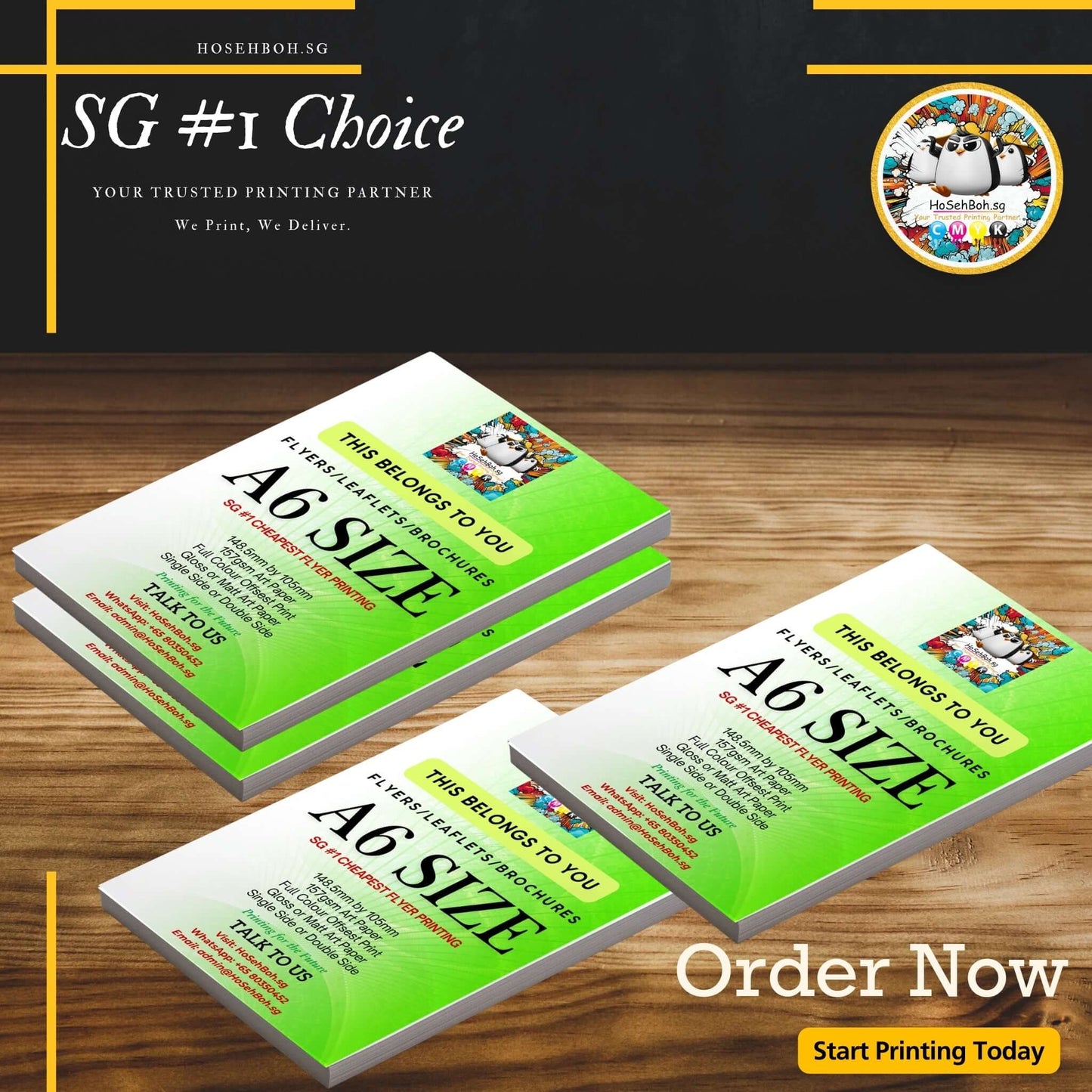 Custom A6 size flyers on a wooden table, showcasing vibrant designs for impactful marketing in Singapore.